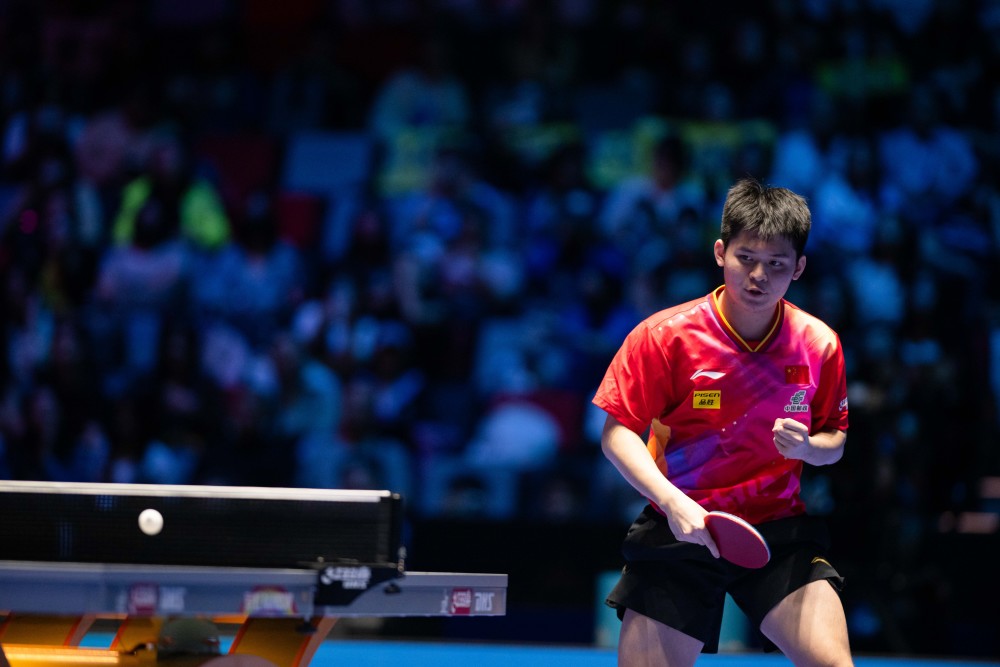 金問題的背 金問題的背